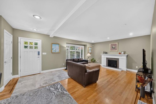 4549 12Th Avenue W, Vancouver, BC - Indoor Photo Showing Living Room With Fireplace