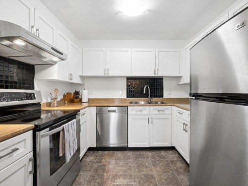 2419 1St Avenue W, Vancouver, BC - Indoor Photo Showing Kitchen With Double Sink
