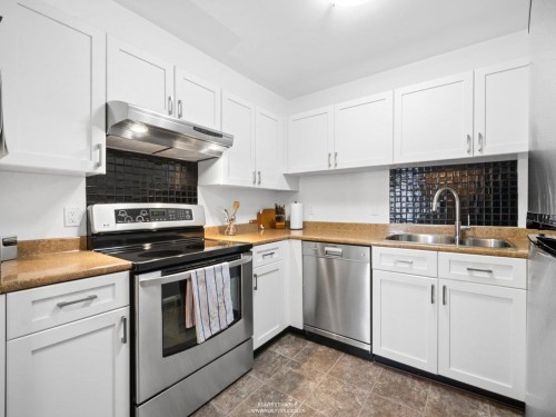 2419 1St Avenue W, Vancouver, BC - Indoor Photo Showing Kitchen With Double Sink