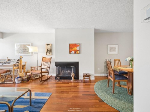 2419 1St Avenue W, Vancouver, BC - Indoor Photo Showing Living Room With Fireplace