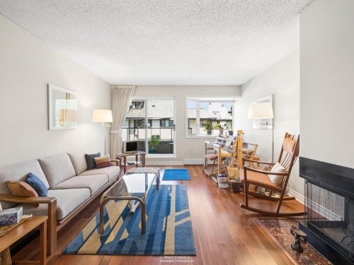 2419 1St Avenue W, Vancouver, BC - Indoor Photo Showing Living Room With Fireplace