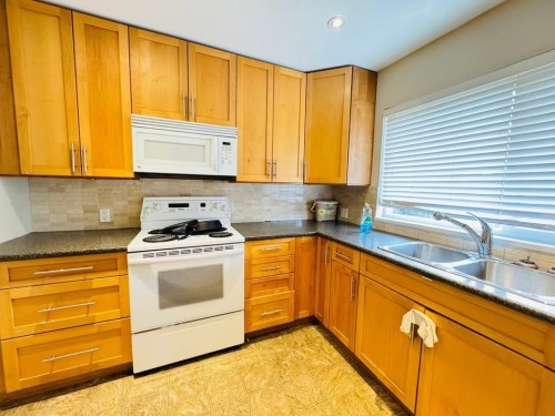 8400 Fairhurst Road, Richmond, BC - Indoor Photo Showing Kitchen With Double Sink