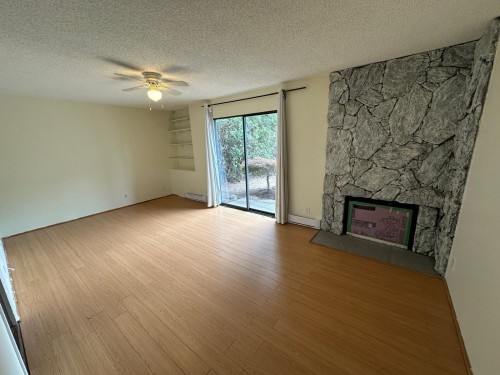 11437 Kingcome Avenue, Richmond, BC - Indoor Photo Showing Other Room With Fireplace