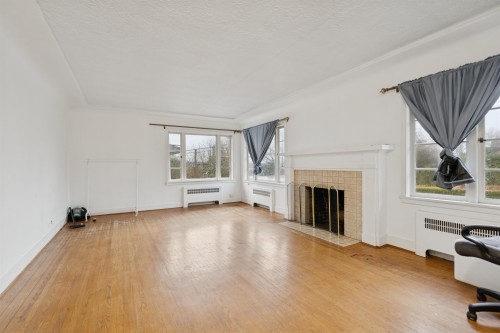 1830 33Rd Avenue W, Vancouver, BC - Indoor Photo Showing Living Room With Fireplace