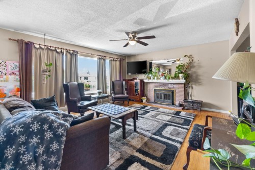2119 Monterey Avenue, Coquitlam, BC - Indoor Photo Showing Living Room With Fireplace