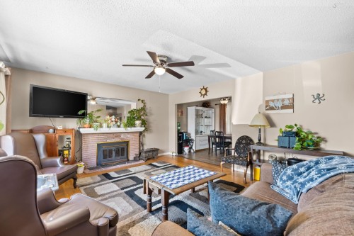 2119 Monterey Avenue, Coquitlam, BC - Indoor Photo Showing Living Room With Fireplace