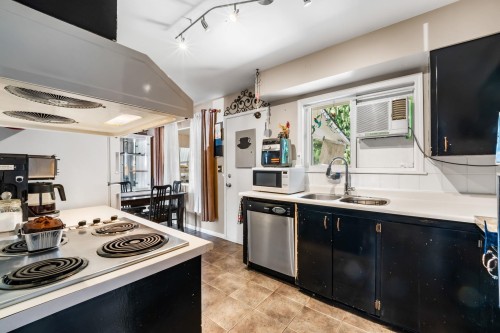 2119 Monterey Avenue, Coquitlam, BC - Indoor Photo Showing Kitchen With Double Sink