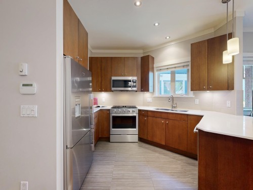 839 14Th Avenue W, Vancouver, BC - Indoor Photo Showing Kitchen With Double Sink