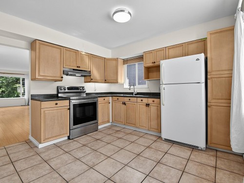 2216 41St Avenue E, Vancouver, BC - Indoor Photo Showing Kitchen With Double Sink