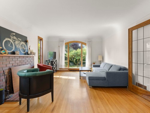4691 5Th Avenue W, Vancouver, BC - Indoor Photo Showing Living Room With Fireplace