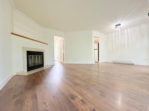 8-7400 Minoru Boulevard, Richmond, BC - Indoor Photo Showing Living Room With Fireplace