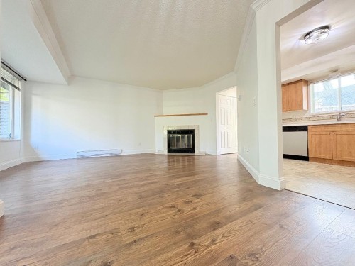 8-7400 Minoru Boulevard, Richmond, BC - Indoor Photo Showing Living Room With Fireplace