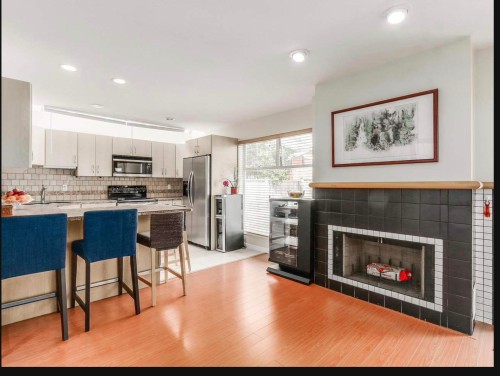4055 31St Avenue W, Vancouver, BC - Indoor Photo Showing Kitchen With Fireplace With Upgraded Kitchen