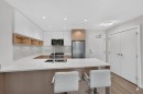 105-8940 University Crescent, Burnaby, BC  - Indoor Photo Showing Kitchen With Stainless Steel Kitchen With Double Sink With Upgraded Kitchen 
