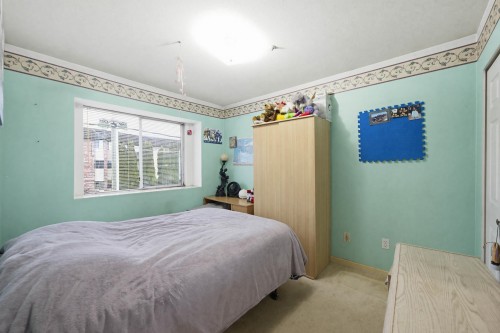 557 44Th Avenue E, Vancouver, BC - Indoor Photo Showing Bedroom