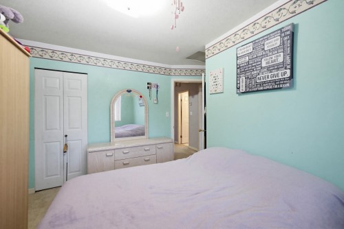 557 44Th Avenue E, Vancouver, BC - Indoor Photo Showing Bedroom