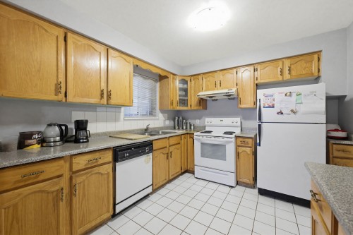 557 44Th Avenue E, Vancouver, BC - Indoor Photo Showing Kitchen With Double Sink