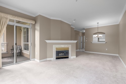 207-2985 Princess Crescent, Coquitlam, BC - Indoor With Fireplace