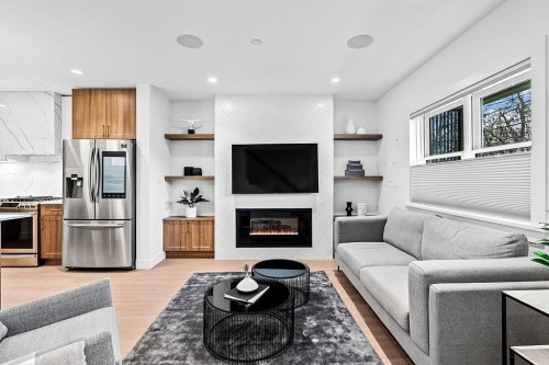 1022 Odlum Drive, Vancouver, BC - Indoor Photo Showing Living Room With Fireplace