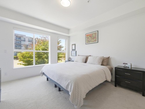 210-10177 River Drive, Richmond, BC - Indoor Photo Showing Bedroom