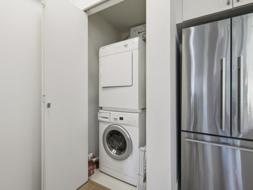 210-10177 River Drive, Richmond, BC - Indoor Photo Showing Laundry Room