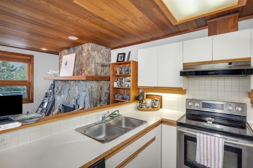 109-6117 Eagle Drive, Whistler, BC - Indoor Photo Showing Kitchen With Fireplace With Double Sink
