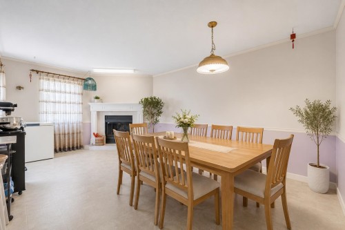 415 Goyer Court, Coquitlam, BC - Indoor Photo Showing Dining Room With Fireplace