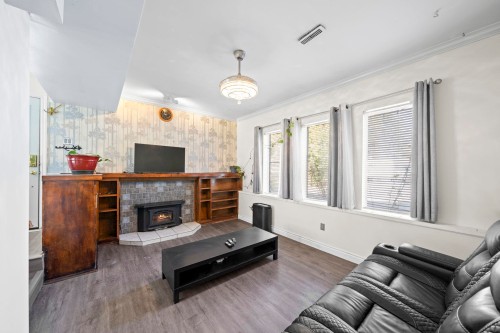21796 Howison Avenue, Maple Ridge, BC - Indoor Photo Showing Living Room With Fireplace