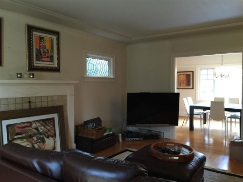 4633 4Th Avenue W, Vancouver, BC - Indoor Photo Showing Living Room With Fireplace