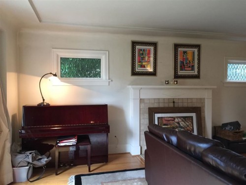 4633 4Th Avenue W, Vancouver, BC - Indoor Photo Showing Living Room With Fireplace
