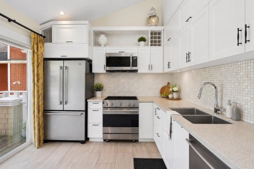 3541 8Th Avenue W, Vancouver, BC - Indoor Photo Showing Kitchen With Double Sink With Upgraded Kitchen