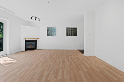3027 7Th Avenue W, Vancouver, BC - Indoor Photo Showing Other Room With Fireplace