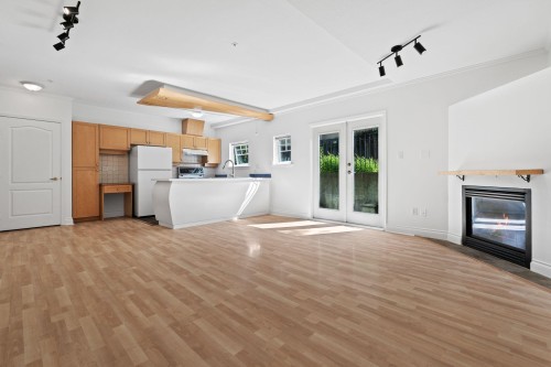 3027 7Th Avenue W, Vancouver, BC - Indoor Photo Showing Kitchen With Fireplace