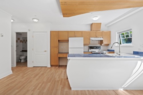 3027 7Th Avenue W, Vancouver, BC - Indoor Photo Showing Kitchen With Double Sink