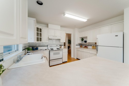 4682 14Th Avenue W, Vancouver, BC - Indoor Photo Showing Kitchen With Double Sink