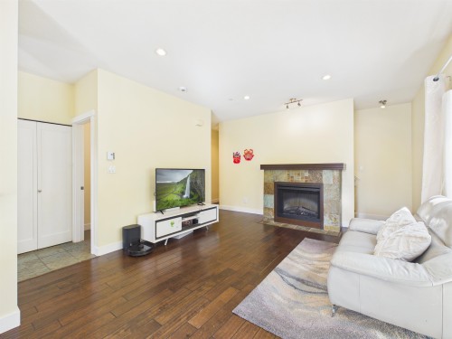 141-7388 Macpherson Avenue, Burnaby, BC - Indoor Photo Showing Living Room With Fireplace
