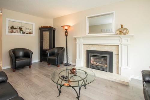 10831 Altona Place, Richmond, BC - Indoor Photo Showing Living Room With Fireplace