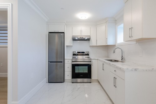 3559 48Th Avenue E, Vancouver, BC - Indoor Photo Showing Kitchen With Double Sink