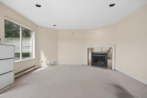 2986 37Th Avenue W, Vancouver, BC - Indoor Photo Showing Other Room With Fireplace