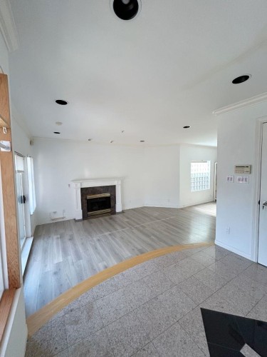 8377 Hudson Street, Vancouver, BC - Indoor Photo Showing Other Room With Fireplace