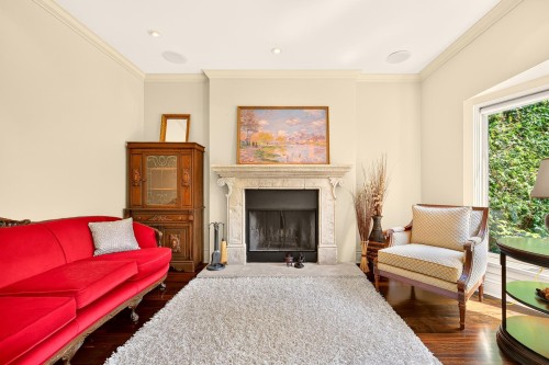 3835 12Th Avenue W, Vancouver, BC - Indoor Photo Showing Living Room With Fireplace
