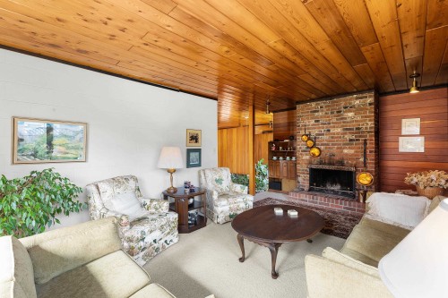 1042 Kuma Crescent, Delta, BC - Indoor Photo Showing Living Room With Fireplace