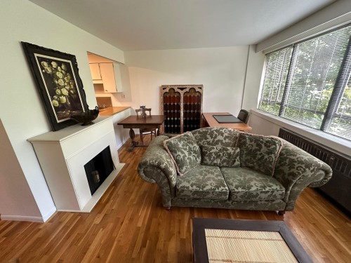 715-1445 Marpole Avenue, Vancouver, BC - Indoor Photo Showing Living Room With Fireplace
