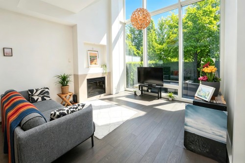 107-5151 Brighthouse Way, Richmond, BC - Indoor Photo Showing Living Room With Fireplace