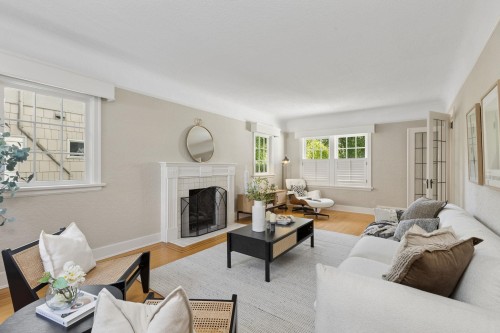 3933 King Edward Avenue W, Vancouver, BC - Indoor Photo Showing Living Room With Fireplace