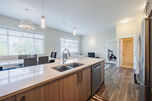 409-22327 River Road, Maple Ridge, BC - Indoor Photo Showing Kitchen With Stainless Steel Kitchen With Double Sink With Upgraded Kitchen