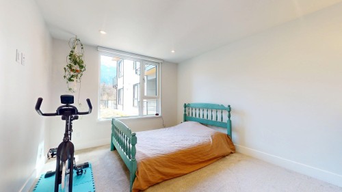 213-1870 Dowad Drive, Squamish, BC - Indoor Photo Showing Bedroom
