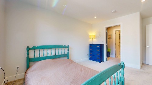 213-1870 Dowad Drive, Squamish, BC - Indoor Photo Showing Bedroom