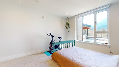 213-1870 Dowad Drive, Squamish, BC - Indoor Photo Showing Bedroom