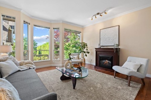 1-230 Keith Road E, North Vancouver, BC - Indoor Photo Showing Living Room With Fireplace